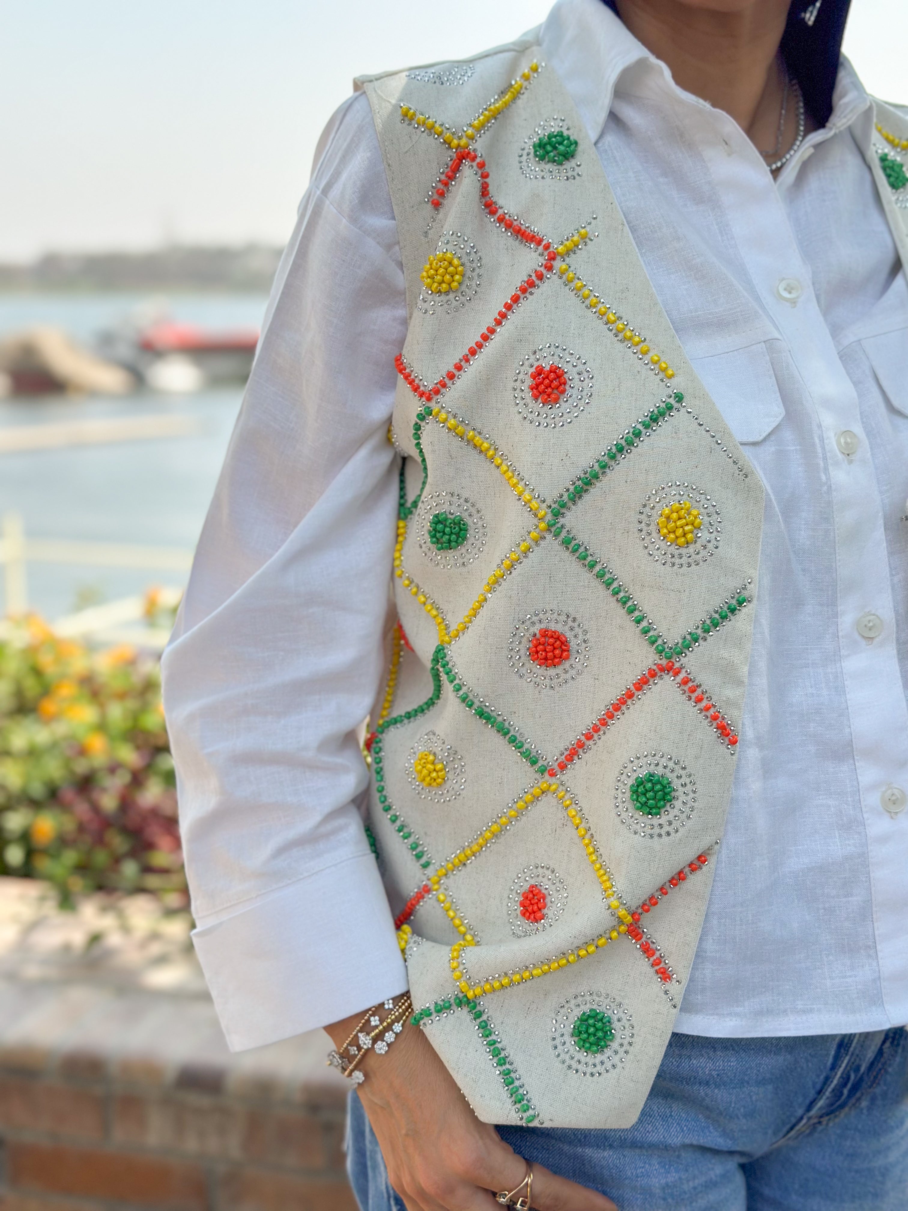 Beige color carnival vest