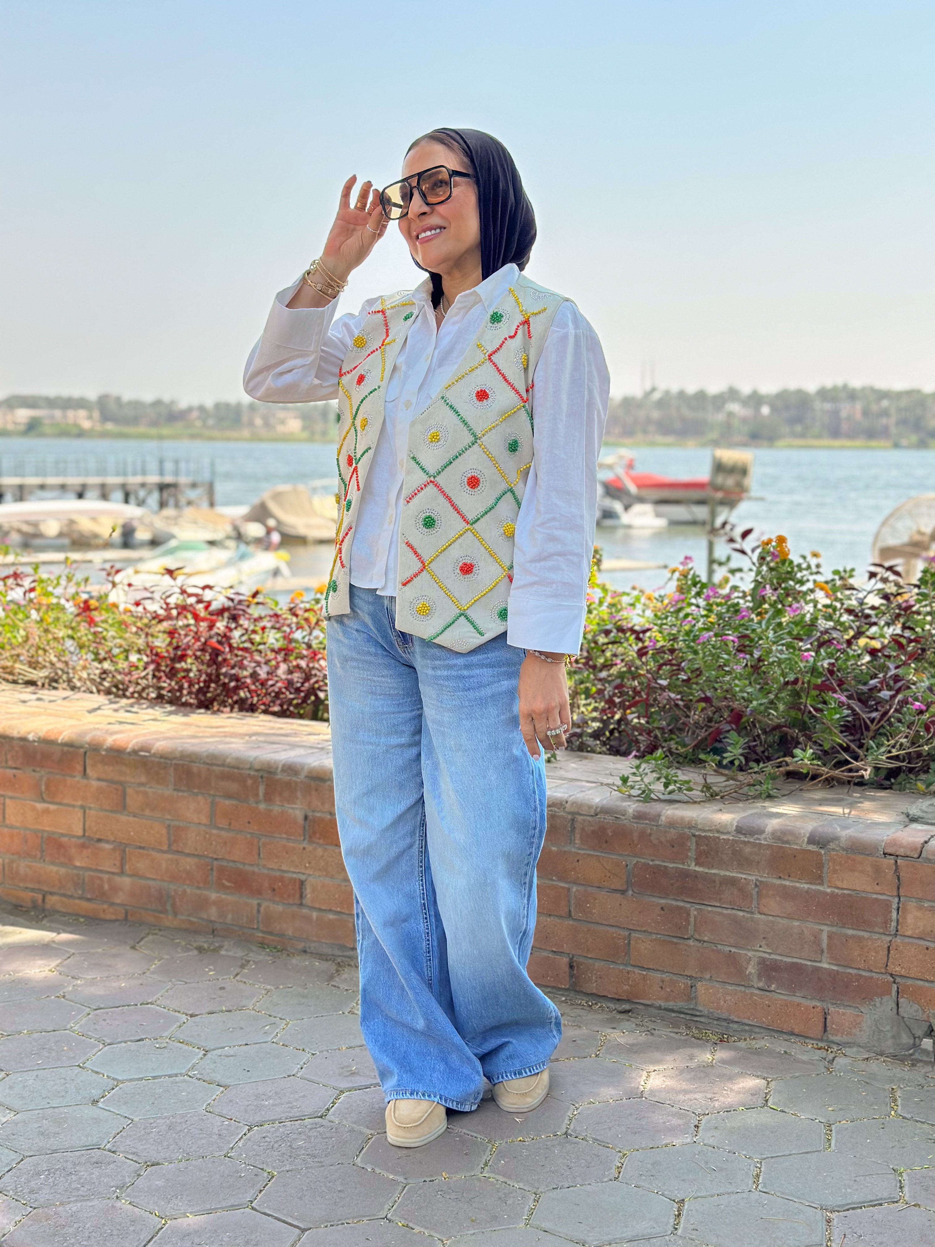 Beige color carnival vest