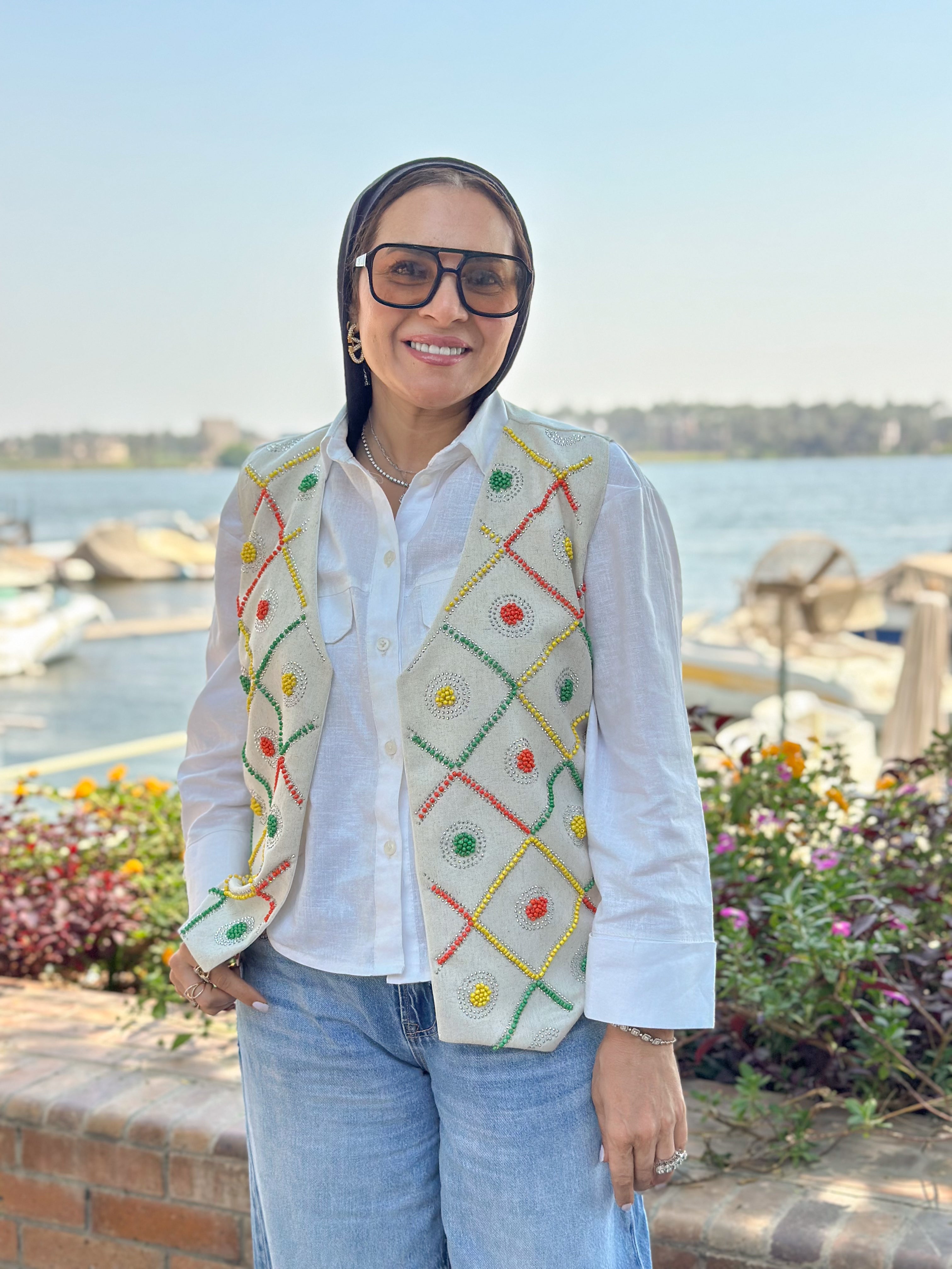 Beige color carnival vest