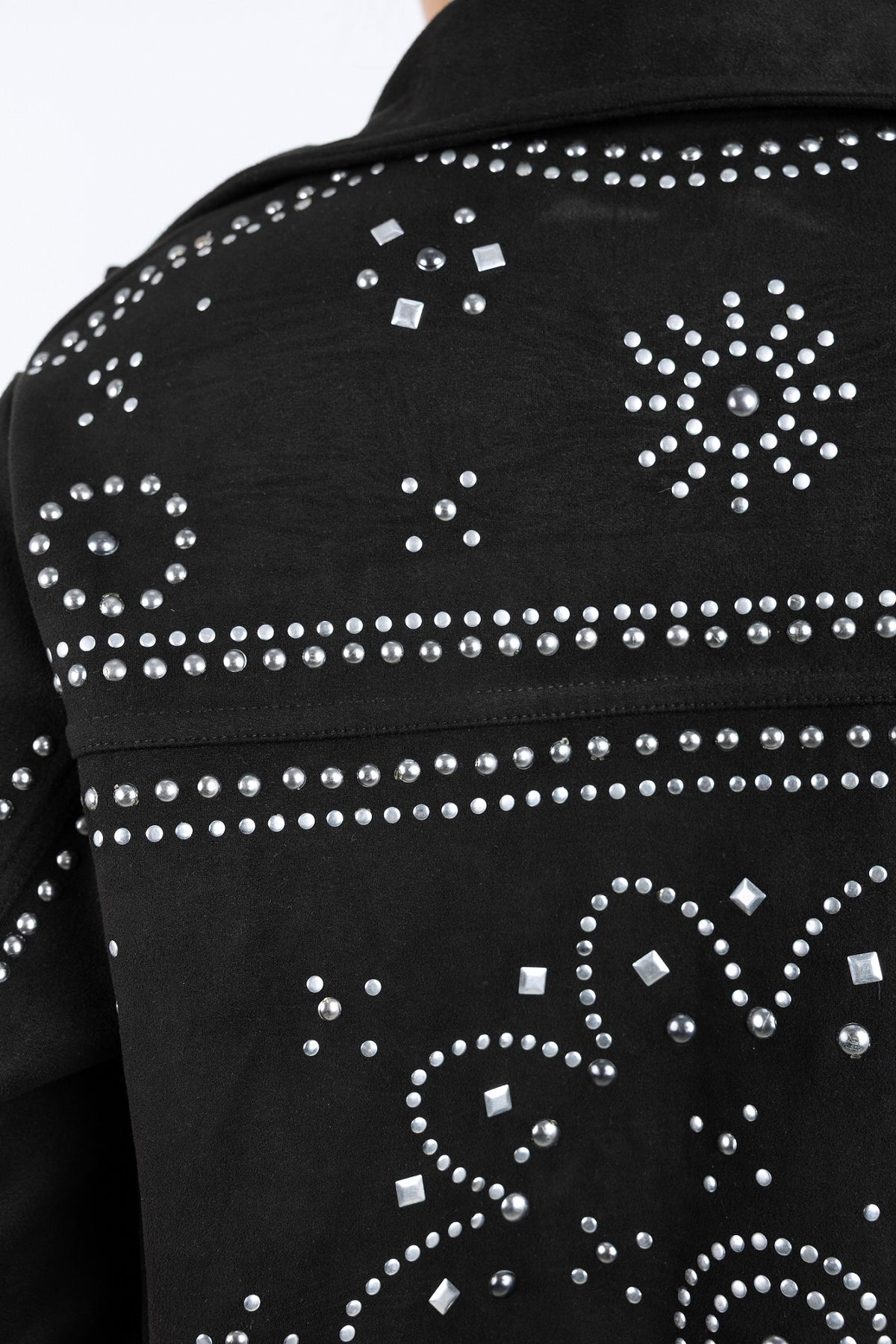 Black jacket with silver rhinestone embellishments on a plain background