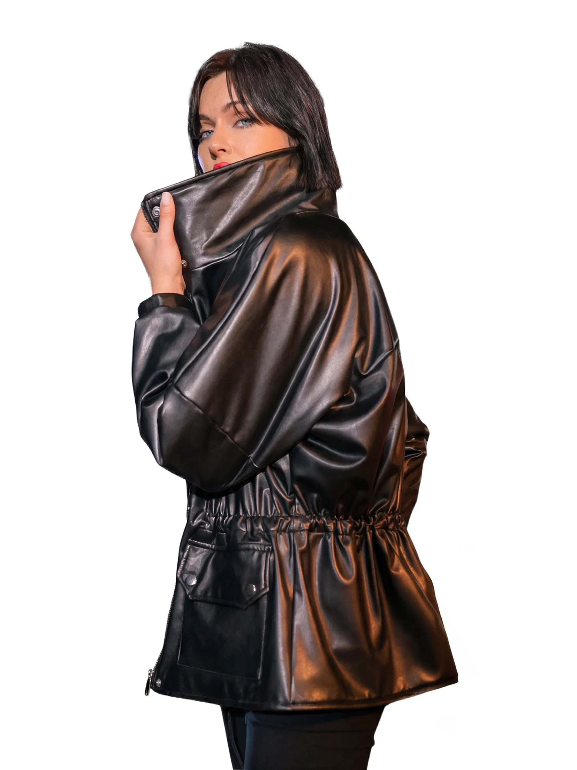 Woman wearing a brown leather jacket on a white background