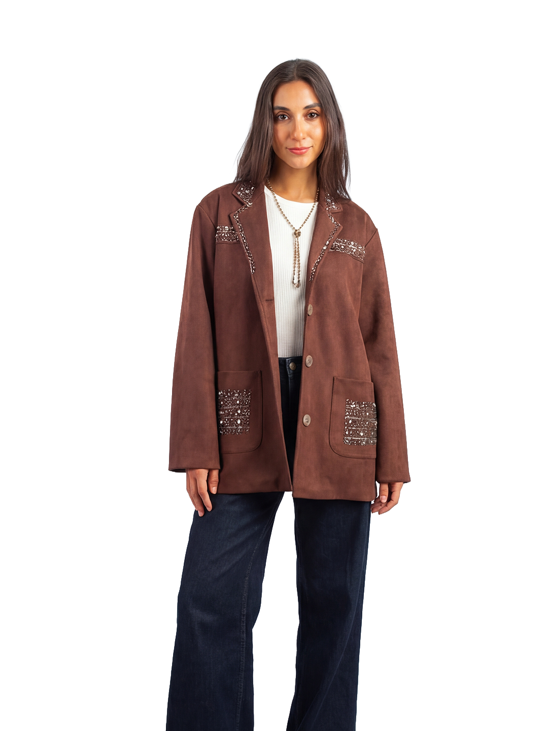 Woman wearing a brown jacket with decorative elements on a white background