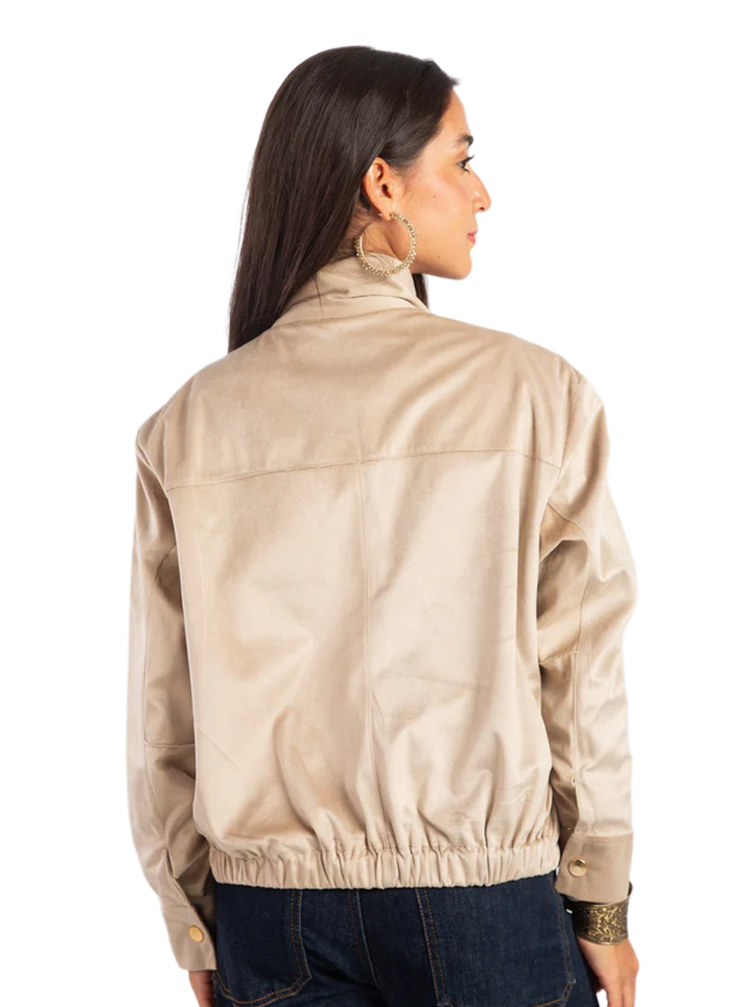 Woman wearing a beige jacket on a white background