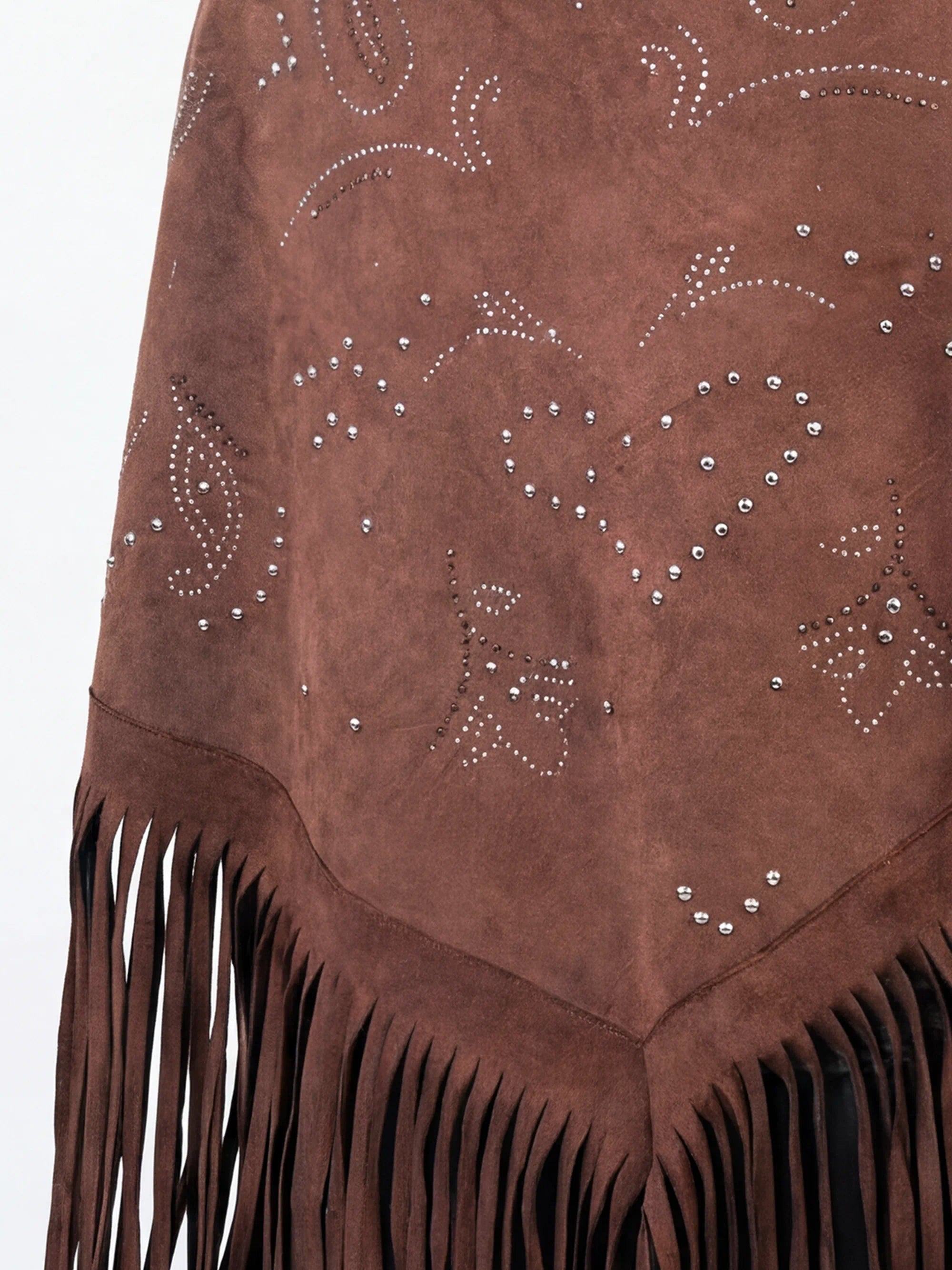 Brown suede fabric with decorative patterns and fringes on a white background